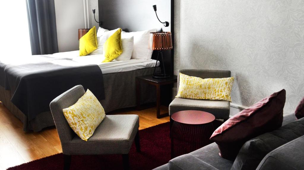 Postel nebo postele na pokoji v ubytování Home Hotel Plaza