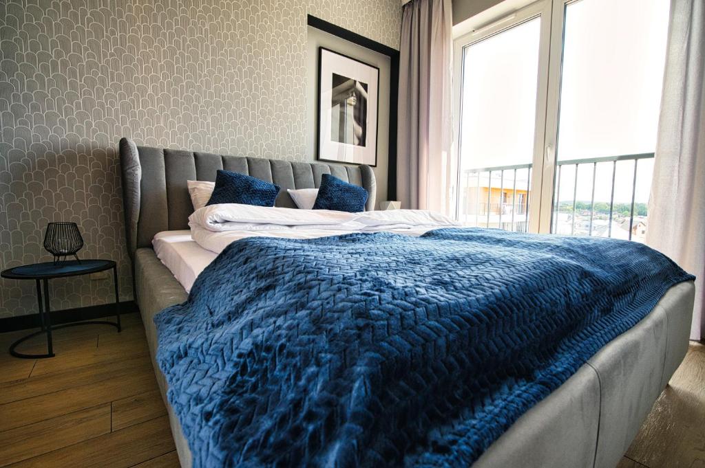 Posteľ alebo postele v izbe v ubytovaní Apartament Timi Zator by Housine
