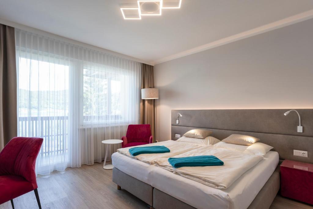 Postel nebo postele na pokoji v ubytování Seehotel Vinzenz