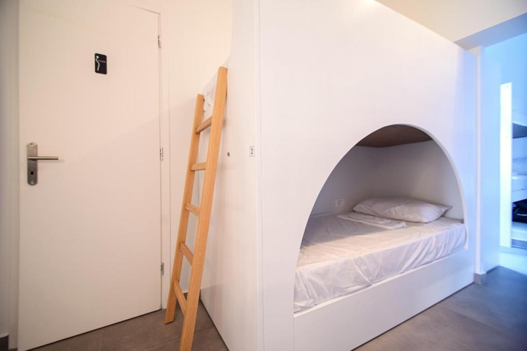 Letto o letti in una camera di Central Hostel Oia