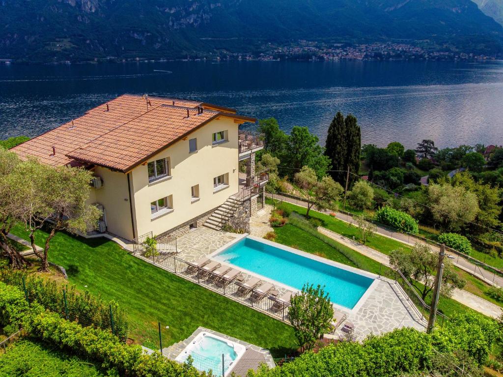 an aerial view of a house with a swimming pool at Villa Breva - Bellagio in Bellagio