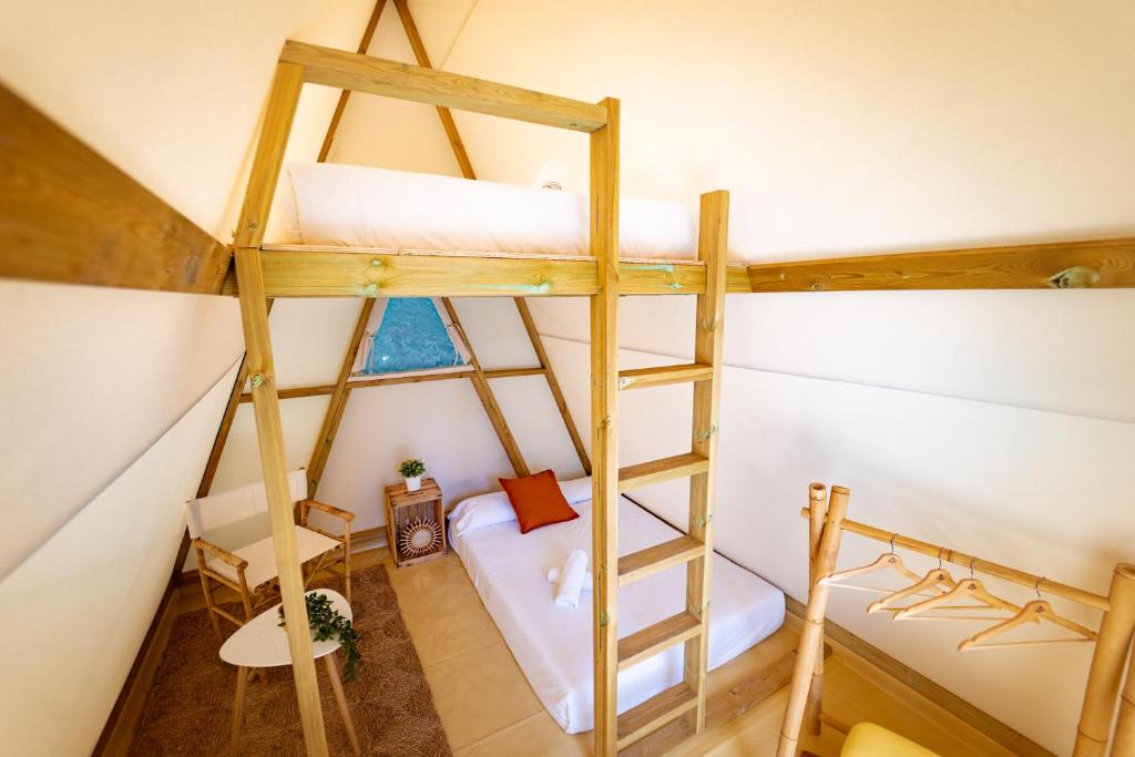 Postel nebo postele na pokoji v ubytování Kampaoh El Palmar