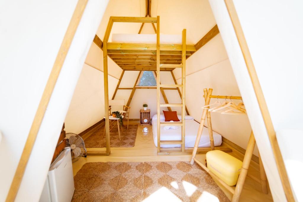 Postel nebo postele na pokoji v ubytování Kampaoh El Palmar