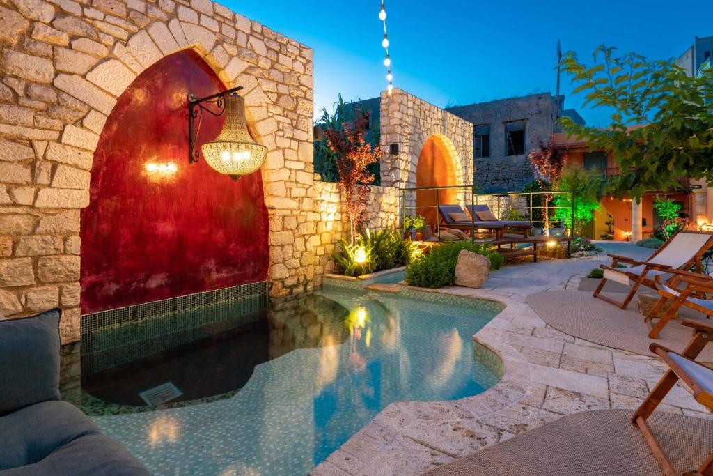 a swimming pool in the middle of a building at Sperveri Boutique Hotel in Rhodes Town