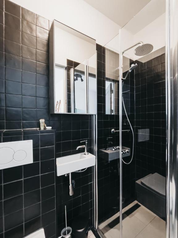 Koupelna v ubytování Hotel Zand