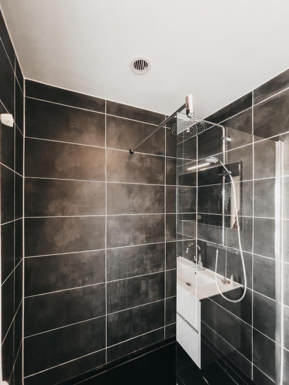 Koupelna v ubytování Hotel Zand
