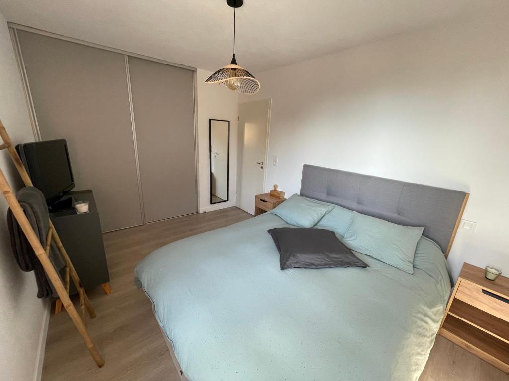 Posteľ alebo postele v izbe v ubytovaní Charmant T2 proche de la plage et au calme