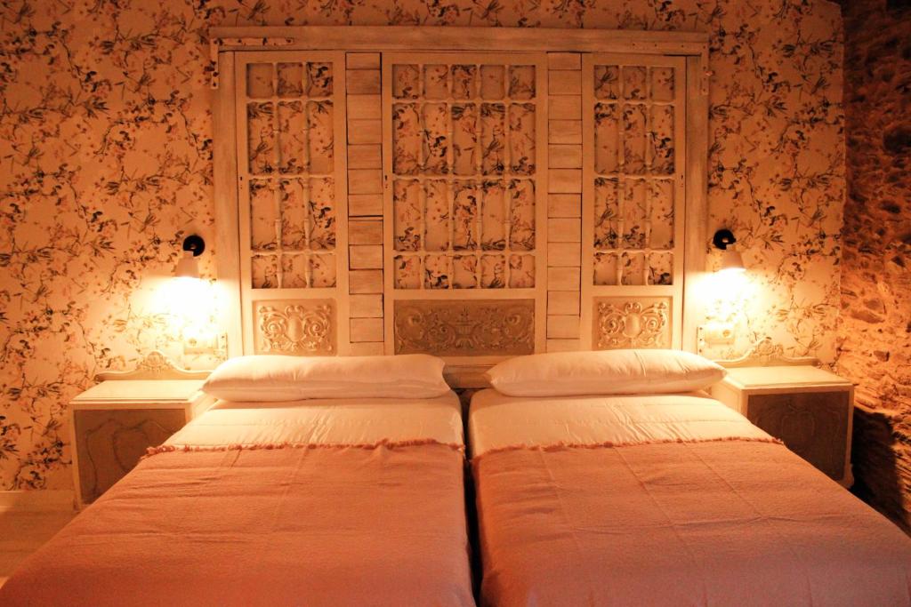 Postel nebo postele na pokoji v ubytování Casa Meiga