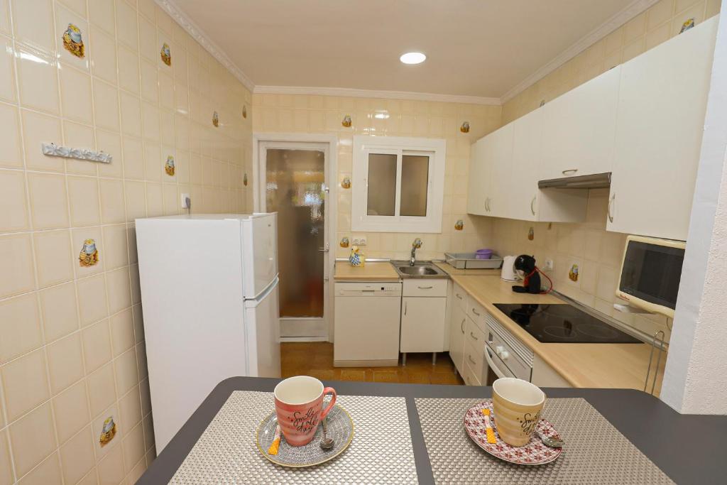 A kitchen or kitchenette at DIFFERENTFLATS Florida