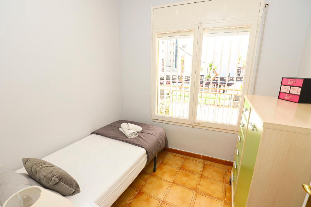 A bed or beds in a room at DIFFERENTFLATS Florida