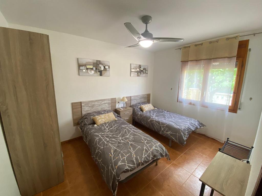 Postel nebo postele na pokoji v ubytování Casa La Gavina