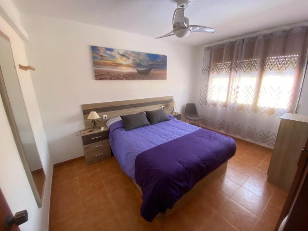 Postel nebo postele na pokoji v ubytování Casa La Gavina