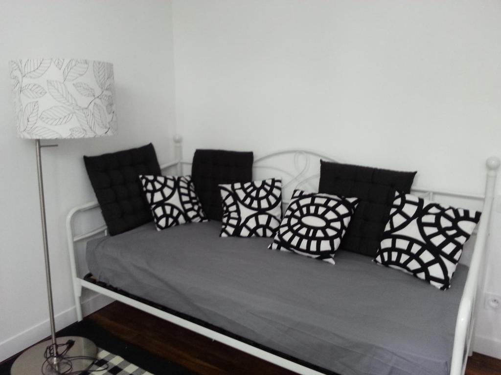 Postel nebo postele na pokoji v ubytování HÔTEL Le 6 3 Home PORT EN BESSIN