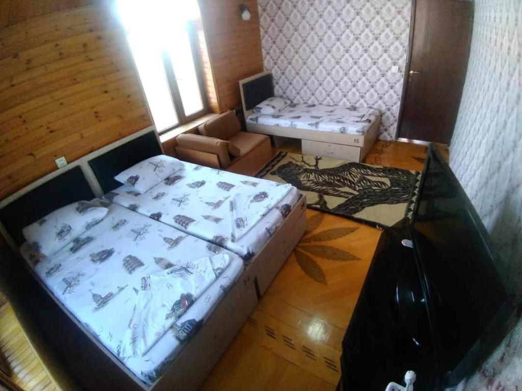 Postel nebo postele na pokoji v ubytování BAKU GUEST HOSTEL