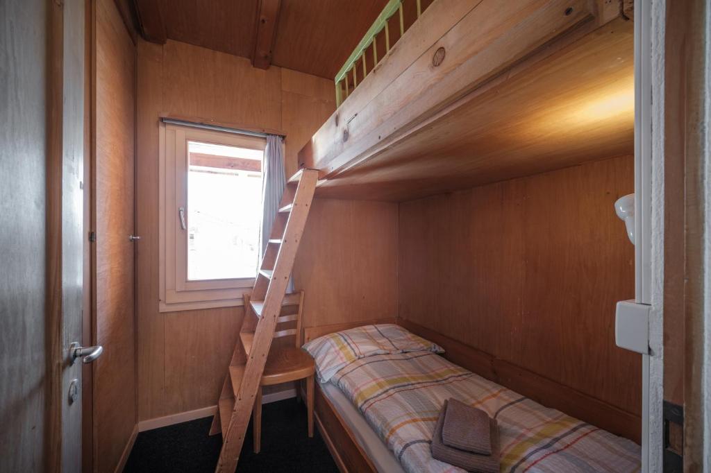 Postel nebo postele na pokoji v ubytování Chalet Höckli Wohnung 1.