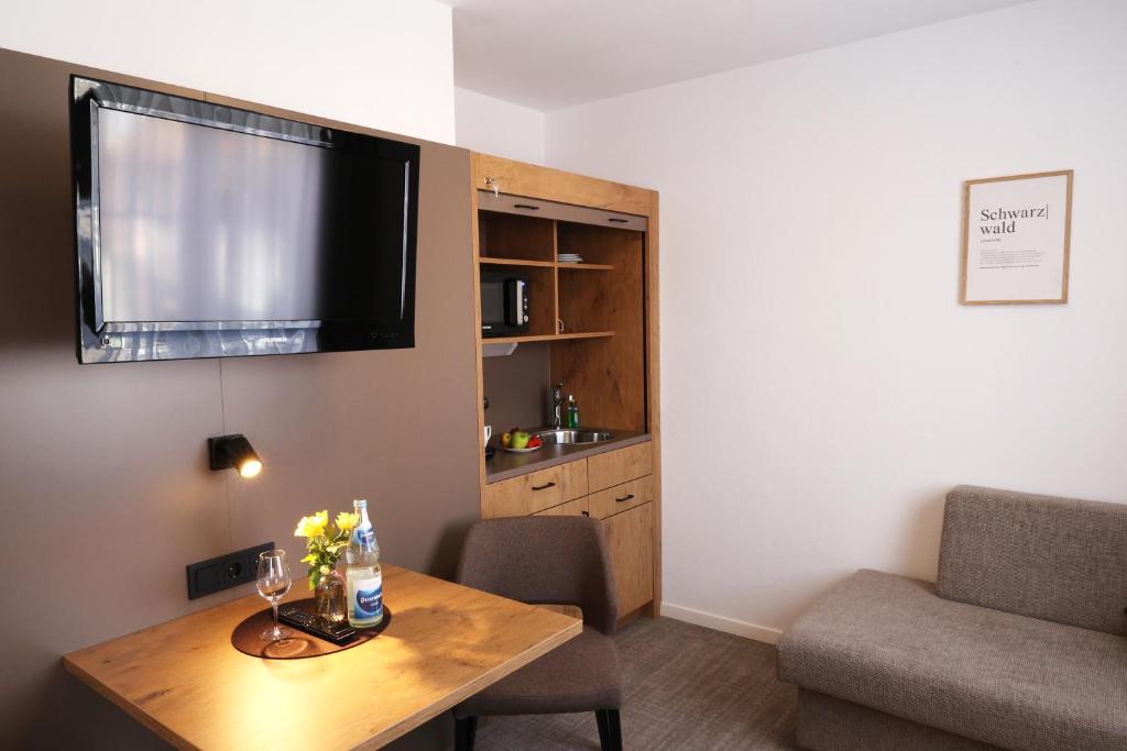 TV a/nebo společenská místnost v ubytování Hotel Gasthof Jägerstüble