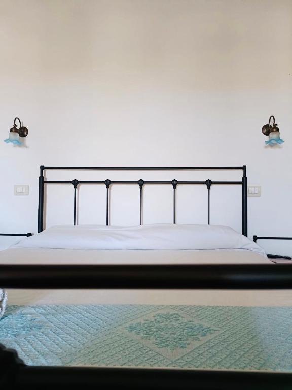 Postel nebo postele na pokoji v ubytování B&B Tre - Rooms & Relax