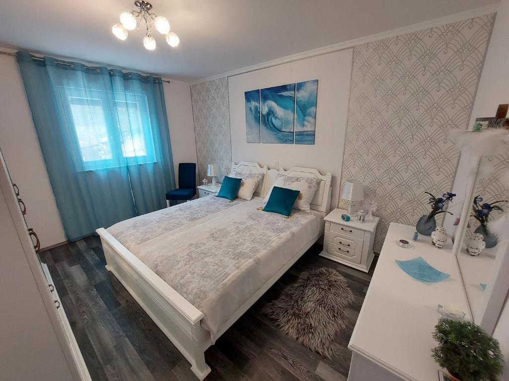 Łóżko lub łóżka w pokoju w obiekcie Villa Madlen