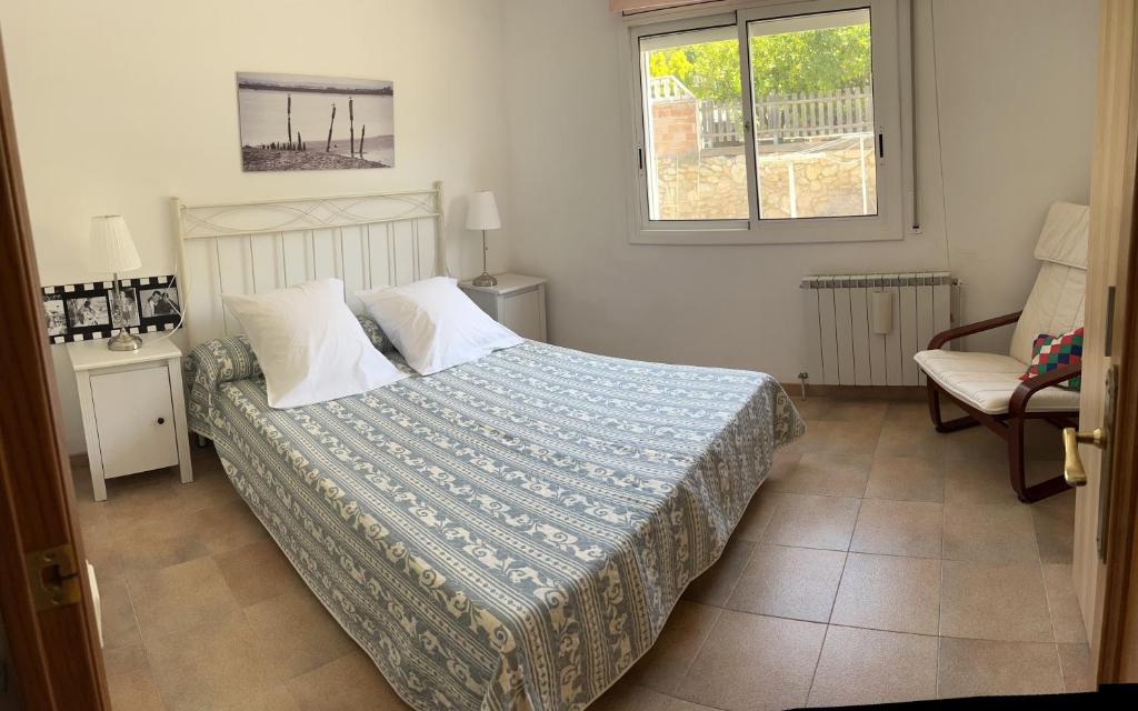 Postel nebo postele na pokoji v ubytování Les Columnes