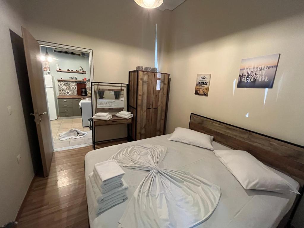 A bed or beds in a room at Thessaloniki Loxandra's House