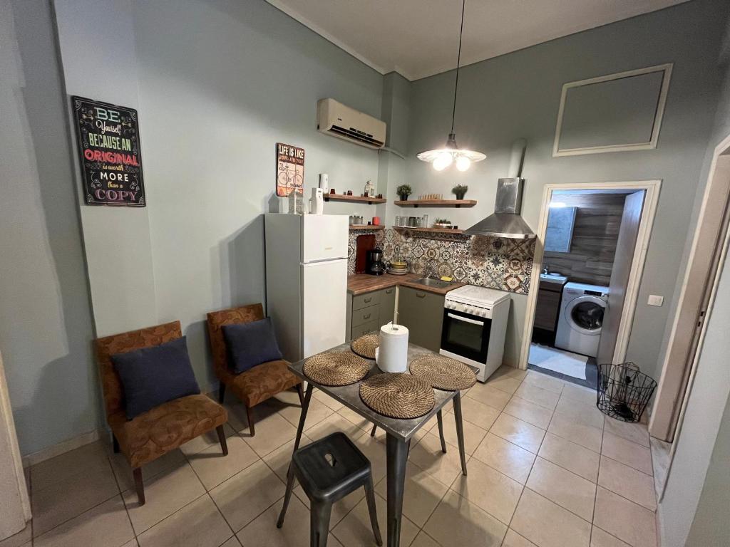 A kitchen or kitchenette at Thessaloniki Loxandra's House