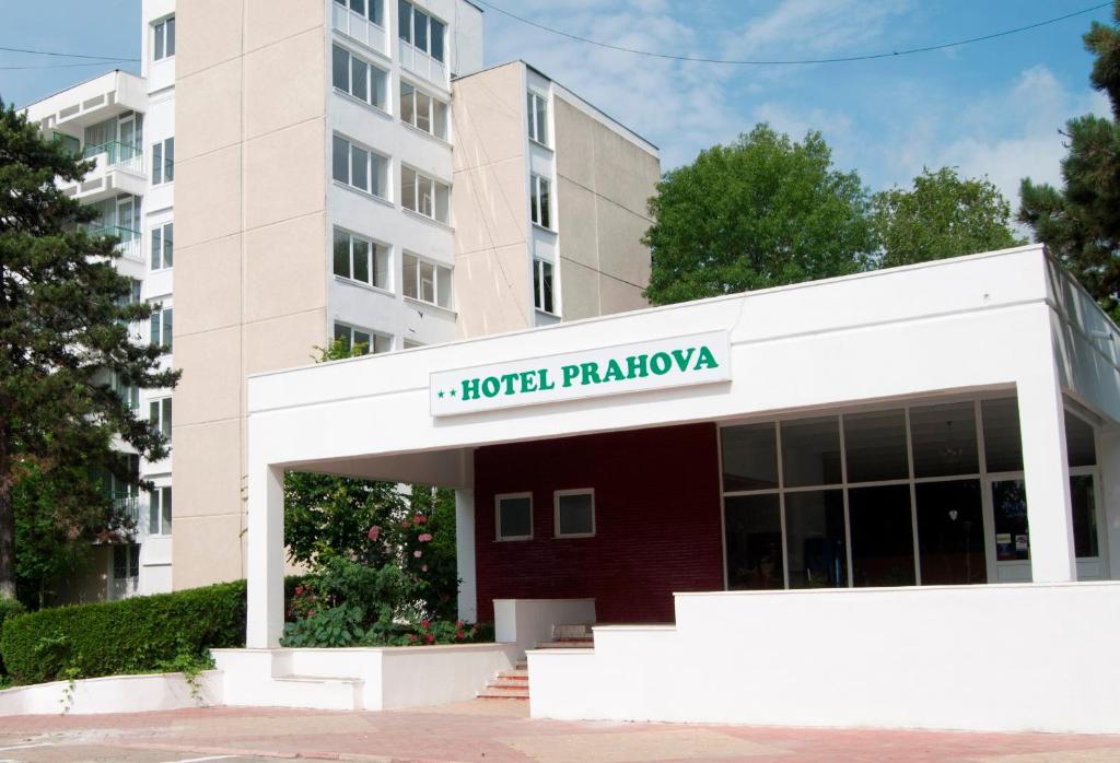 a building with a sign that reads hotel palawan at Hotel Prahova in Saturn