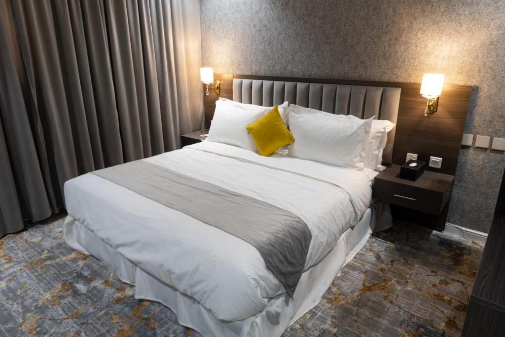 Postel nebo postele na pokoji v ubytování WS Hotel