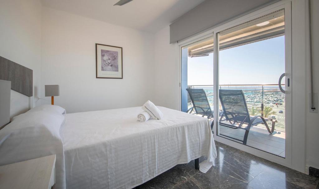 Posteľ alebo postele v izbe v ubytovaní R130 Beachfront Apartment with air conditionner