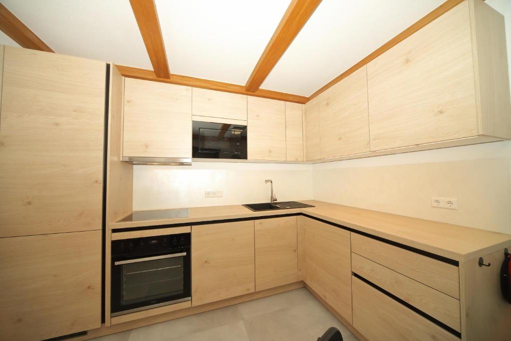Kuchyňa alebo kuchynka v ubytovaní Haus Schroffenstein