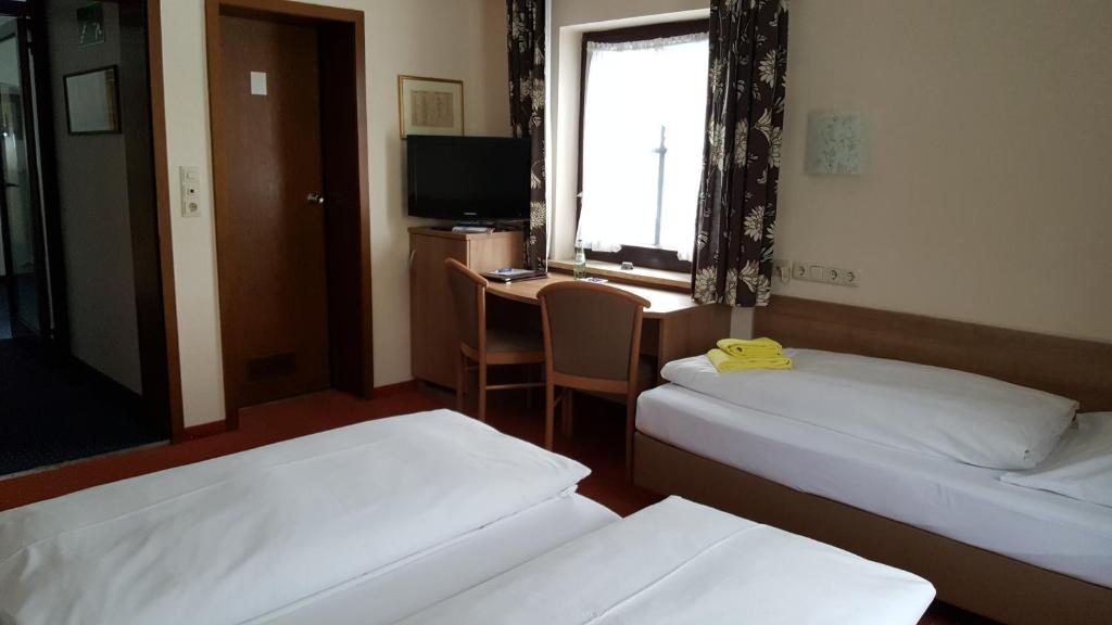 Postel nebo postele na pokoji v ubytování Arrivel am Bergson - bisher Hotel Neuner
