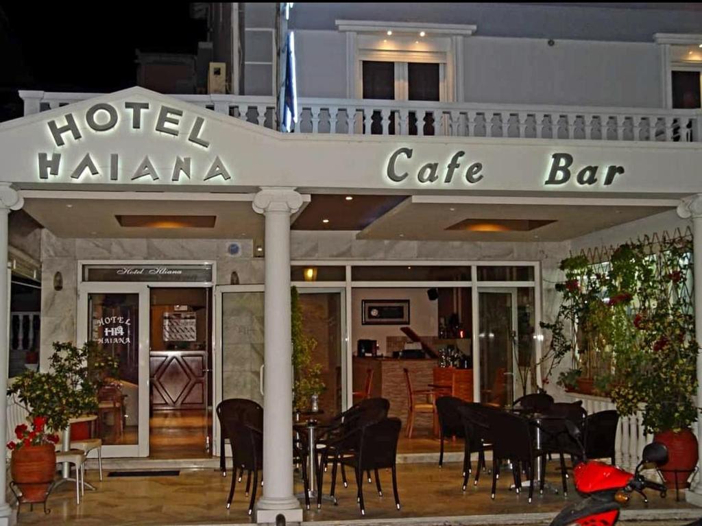 a hotel havana cafe bar with tables and chairs at Iliana Hotel Paralia in Paralia Katerinis