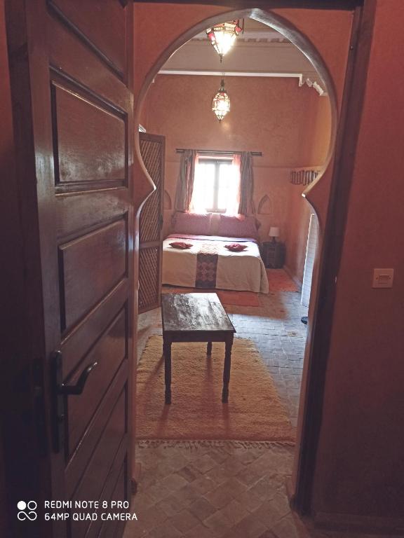 Postel nebo postele na pokoji v ubytování Riad La Rose Des Vents