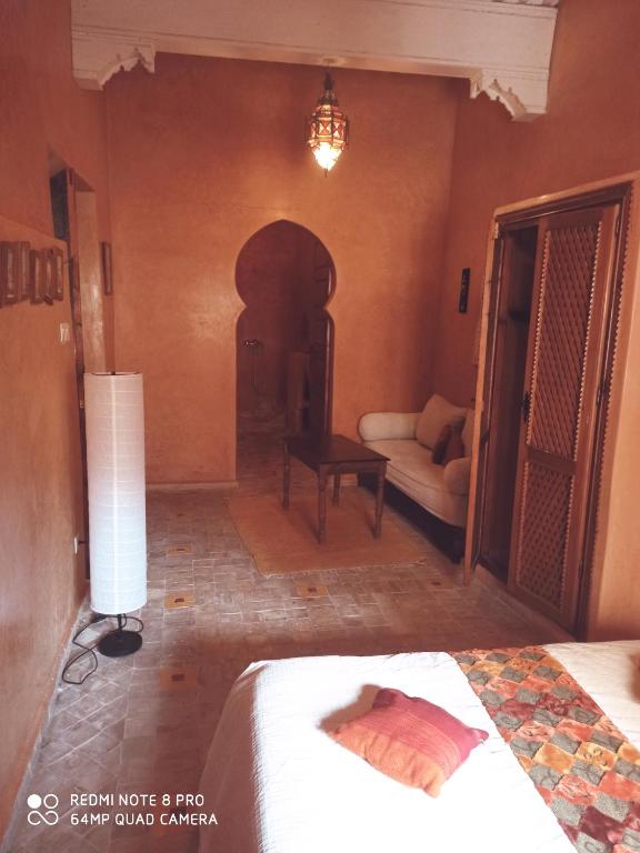 Postel nebo postele na pokoji v ubytování Riad La Rose Des Vents