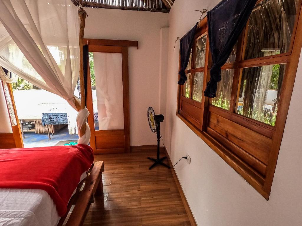 Postel nebo postele na pokoji v ubytování Rustiko Palomino Sierra Nevada