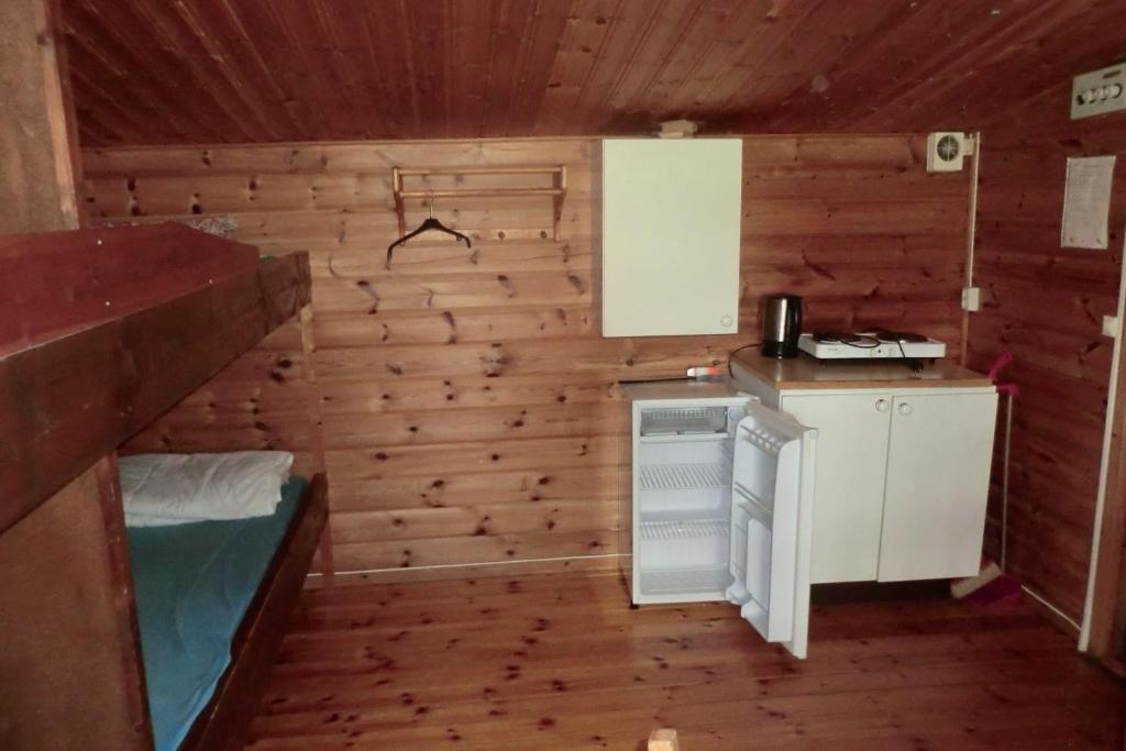 Kuchyň nebo kuchyňský kout v ubytování Backgårdens Stugby