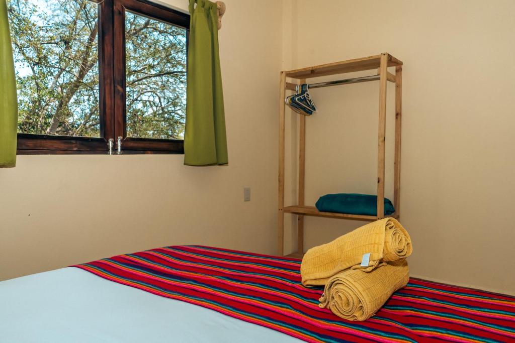 Postel nebo postele na pokoji v ubytování Casa SanMar cerca de la playa