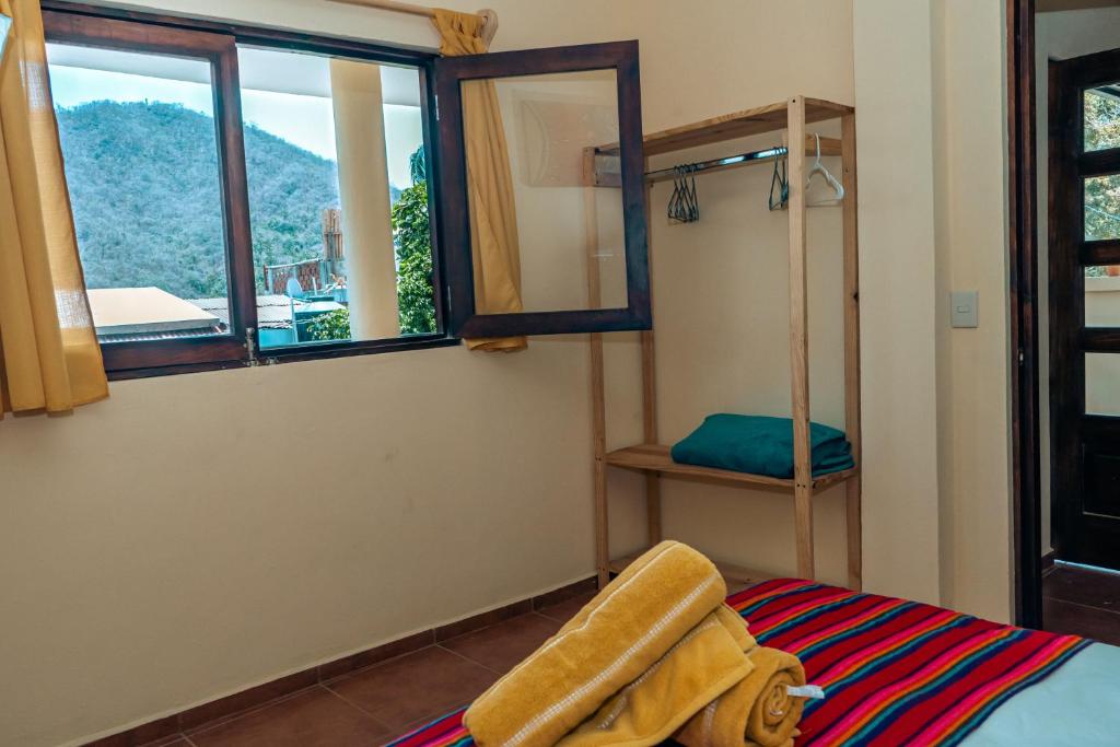 Postel nebo postele na pokoji v ubytování Casa SanMar cerca de la playa
