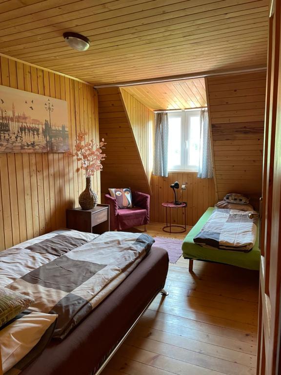 Postel nebo postele na pokoji v ubytování Vrch Varta