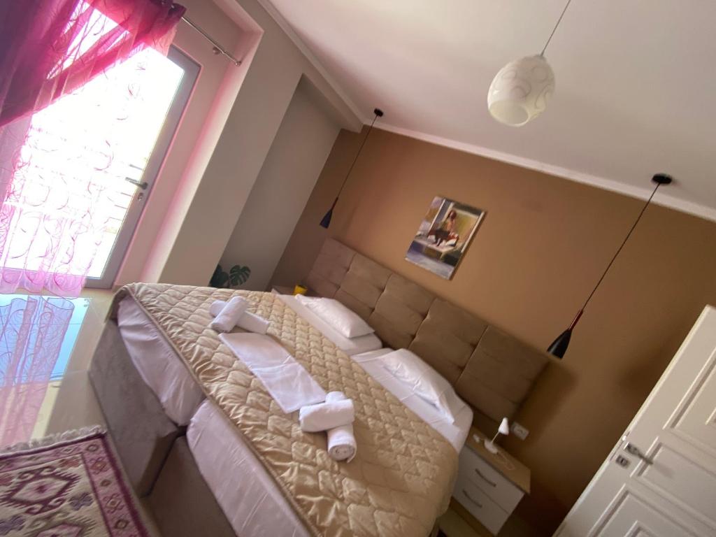 Postel nebo postele na pokoji v ubytování Guest's Apartament