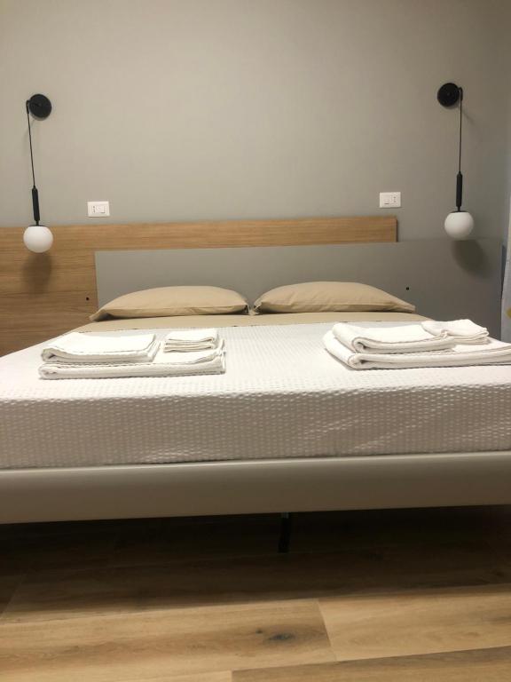 Postel nebo postele na pokoji v ubytování A Due Passi Dalla Scalinata Rooms