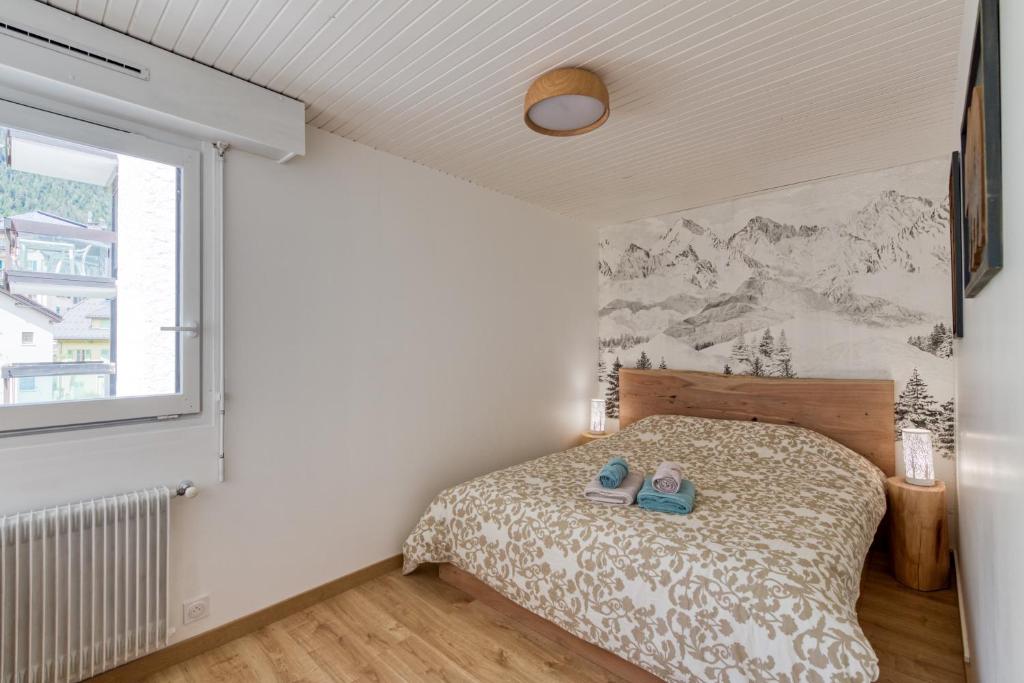 Posteľ alebo postele v izbe v ubytovaní Le Petit Balcon avec vue sur le Mont-Blanc 2 étoiles
