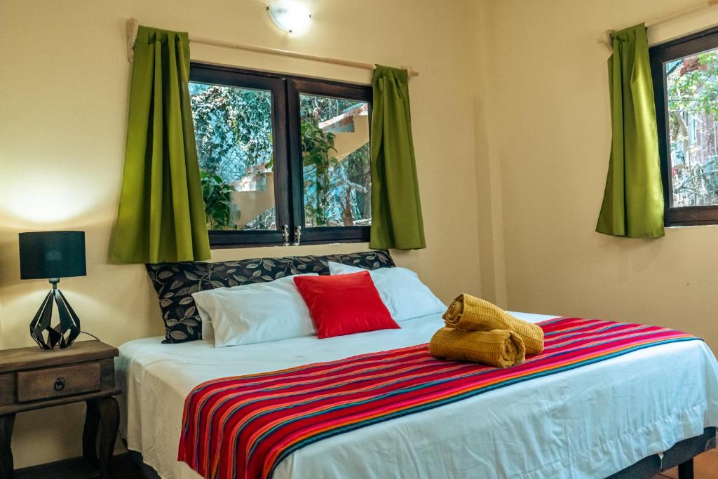 Postel nebo postele na pokoji v ubytování Casa SanMar cerca de la playa