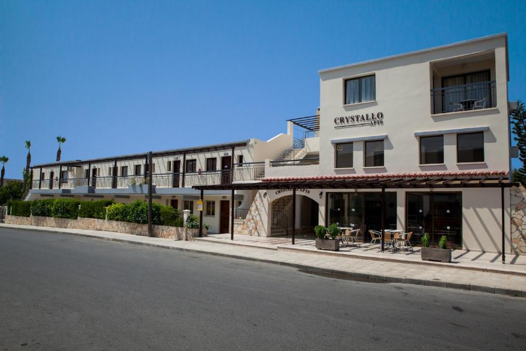 a building on the side of a street at Crystallo Apartments in Paphos City