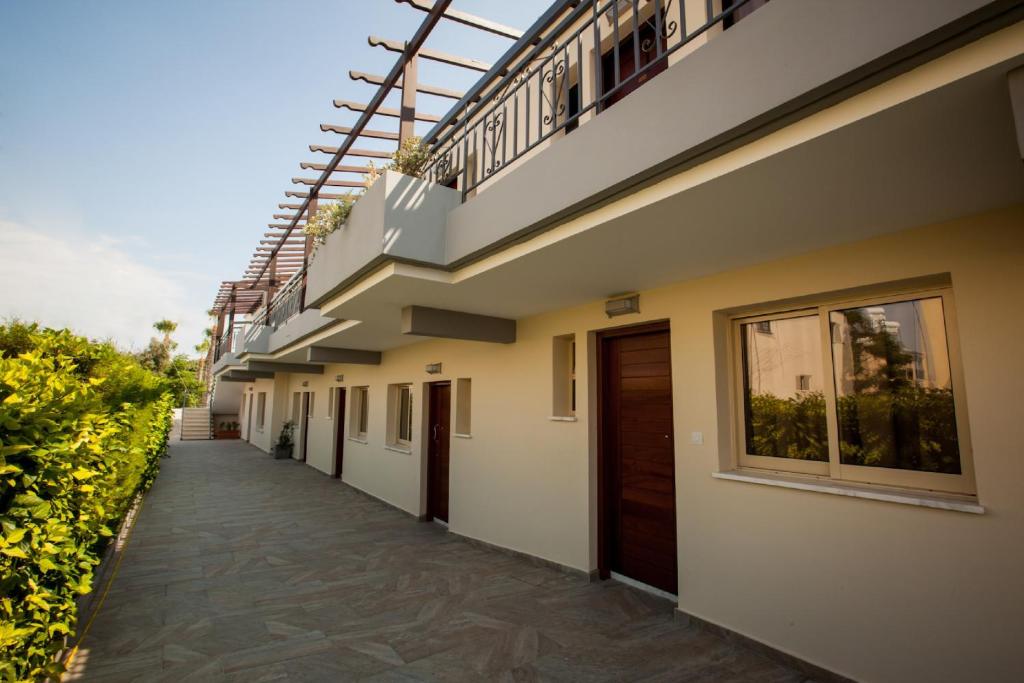 a walkway next to a building at Crystallo Apartments in Paphos