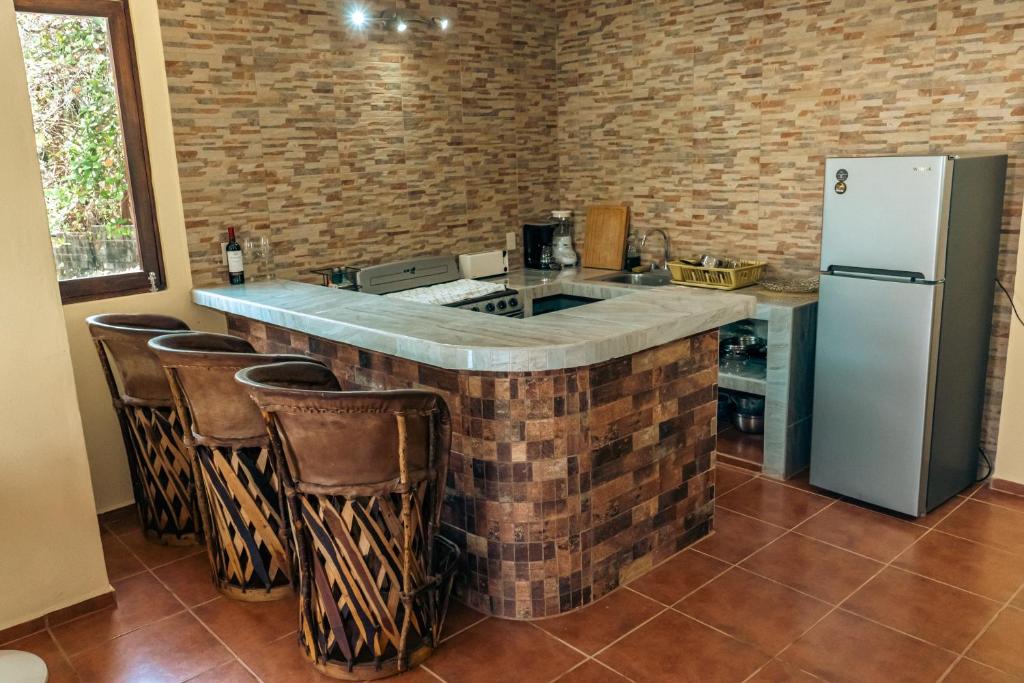 Kuchyň nebo kuchyňský kout v ubytování Casa SanMar cerca de la playa