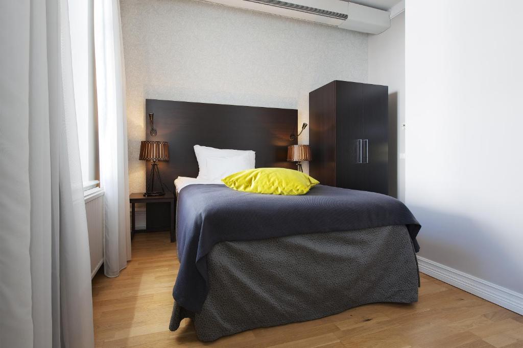 Postel nebo postele na pokoji v ubytování Home Hotel Plaza