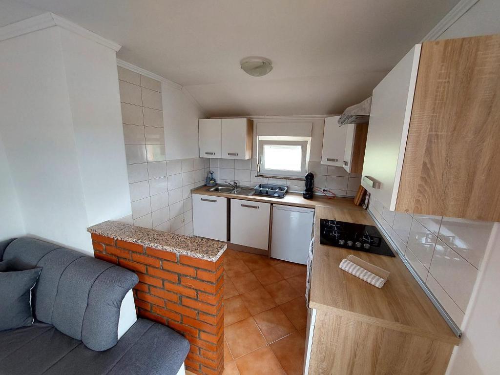 Kuchyň nebo kuchyňský kout v ubytování Apartman Željo