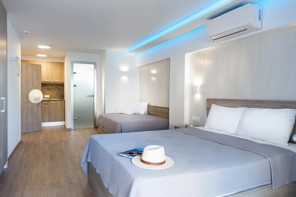 Posteľ alebo postele v izbe v ubytovaní Summer Inn