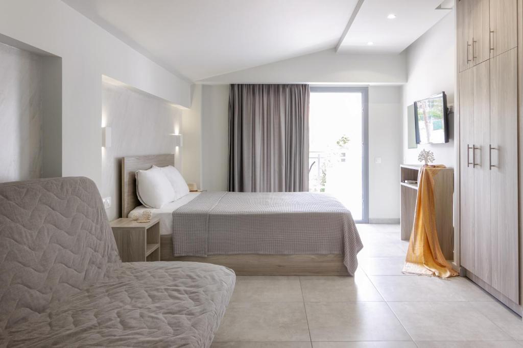 Posteľ alebo postele v izbe v ubytovaní Summer Inn