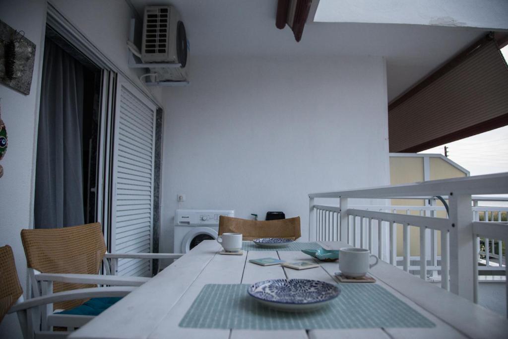 Posezení v ubytování Grey Theros Apartments
